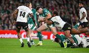 23 November 2024; Jacob Stockdale of Ireland is tackled by Tevita Ikanivere of Fiji during the Autumn Nations Series match between Ireland and Fiji at the Aviva Stadium in Dublin. Photo by Brendan Moran/Sportsfile
