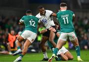 23 November 2024; Jiuta Wainiqolo of Fiji in action against Bundee Aki, left, and Jacob Stockdale of Ireland during the Autumn Nations Series match between Ireland and Fiji at the Aviva Stadium in Dublin. Photo by Shauna Clinton/Sportsfile