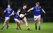 23 November 2024; Anthony Morgan of Kilcoo in action against Ryan O'Toole of Scotstown during the AIB Ulster GAA Senior Club Football Championship semi-final match between Kilcoo and Scotstown at Box-IT Athletic Grounds in Armagh. Photo by Ramsey Cardy/Sportsfile