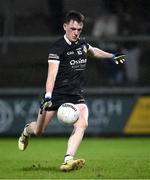 23 November 2024; Christopher Rooney of Kilcoo shoots to score his side's second goal during the AIB Ulster GAA Senior Club Football Championship semi-final match between Kilcoo and Scotstown at Box-IT Athletic Grounds in Armagh. Photo by Ramsey Cardy/Sportsfile