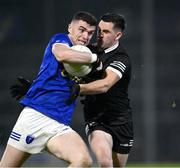 23 November 2024; Mícheál McCarville of Scotstown in action against Darryl Branagan of Kilcoo during the AIB Ulster GAA Senior Club Football Championship semi-final match between Kilcoo and Scotstown at Box-IT Athletic Grounds in Armagh. Photo by Ramsey Cardy/Sportsfile