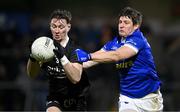 23 November 2024; Ryan McEvoy of Kilcoo in action against Darren Hughes of Scotstown during the AIB Ulster GAA Senior Club Football Championship semi-final match between Kilcoo and Scotstown at Box-IT Athletic Grounds in Armagh. Photo by Ramsey Cardy/Sportsfile