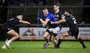 23 November 2024; Jack McCarron of Scotstown in action against Ryan Johnston, left, and Niall Branagan of Kilcoo during the AIB Ulster GAA Senior Club Football Championship semi-final match between Kilcoo and Scotstown at Box-IT Athletic Grounds in Armagh. Photo by Ramsey Cardy/Sportsfile