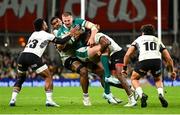 23 November 2024; Stuart McCloskey of Ireland in action against Fiji players, from left, Mesake Vocevoce, Peni Matawalu and Caleb Muntz during the Autumn Nations Series match between Ireland and Fiji at the Aviva Stadium in Dublin. Photo by Shauna Clinton/Sportsfile