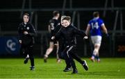 23 November 2024; Kilcoo supporters run onto the pitch after the AIB Ulster GAA Senior Club Football Championship semi-final match between Kilcoo and Scotstown at Box-IT Athletic Grounds in Armagh. Photo by Ramsey Cardy/Sportsfile