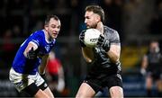 23 November 2024; Kilcoo goalkeeper Niall Kane in action against Jack McCarron of Scotstown during the AIB Ulster GAA Senior Club Football Championship semi-final match between Kilcoo and Scotstown at Box-IT Athletic Grounds in Armagh. Photo by Ramsey Cardy/Sportsfile