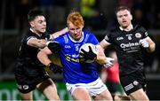 23 November 2024; Ryan O'Toole of Scotstown in action against Ceilum Doherty of Kilcoo during the AIB Ulster GAA Senior Club Football Championship semi-final match between Kilcoo and Scotstown at Box-IT Athletic Grounds in Armagh. Photo by Ramsey Cardy/Sportsfile