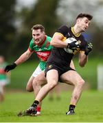 24 November 2024; David Shaw of Dr Crokes in action against James Power of Rathgormack during the AIB Munster GAA Senior Club Football Championship semi-final match between Rathgormack and Dr Crokes at Fraher Field in Dungarvan, Waterford. Photo by Michael P Ryan/Sportsfile