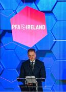 23 November 2024; Fianna Fáil politician and former Minister of State at the Department of Tourism, Culture, Arts, Gaeltacht, Sport and Media and Equality, Thomas Byrne, speaking during the PFA Ireland Awards 2024 at The College Green Hotel in Dublin. Photo by Stephen McCarthy/Sportsfile