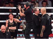15 November 2024; Katie Taylor following her undisputed super lightweight championship fight with Amanda Serrano at AT&T Stadium in Arlington, Texas, USA, also pictured are Katie Taylor's manager Brian Peters and Jordan Maldonado, manager of Amanda Serrano, right. Photo by Stephen McCarthy/Sportsfile Photo by Stephen McCarthy/Sportsfile
