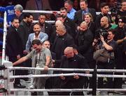 15 November 2024; Promoter Eddie Hearn is ushered from the ring by security as MVP promotions co-founder Nakisa Bidarian gestures in his direction after the undisputed super lightweight championship fight between Katie Taylor and Amanda Serrano at AT&T Stadium in Arlington, Texas, USA. Photo by Stephen McCarthy/Sportsfile Photo by Stephen McCarthy/Sportsfile