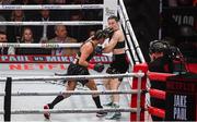 15 November 2024; Amanda Serrano and Katie Taylor, right, during their undisputed super lightweight championship fight at AT&T Stadium in Arlington, Texas, USA. Photo by Stephen McCarthy/Sportsfile Photo by Stephen McCarthy/Sportsfile