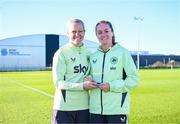26 November 2024; Heather Payne is presented with her Women's Young Player of the Year award by Diane Caldwell, left, after a Republic of Ireland women training session at the FAI National Training Centre in Abbotstown, Dublin. Photo by Stephen McCarthy/Sportsfile