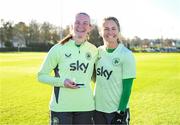 26 November 2024; Goalkeeper Courtney Brosnan is presented with her Senior Women's International Player of the Year award by Kyra Carusa, right, after a Republic of Ireland women training session at the FAI National Training Centre in Abbotstown, Dublin. Photo by Stephen McCarthy/Sportsfile