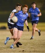 27 November 2024; Tom Doherty of UCD in action against Darragh O'Keeffe of UL during the HE GAA Freshers Football League Division 1 final match between UCD and UL at Billings Park in UCD, Dublin. Photo by Piaras Ó Mídheach/Sportsfile