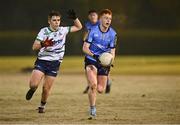 27 November 2024; Tom Doherty of UCD in action against Darragh O'Keeffe of UL during the HE GAA Freshers Football League Division 1 final match between UCD and UL at Billings Park in UCD, Dublin. Photo by Piaras Ó Mídheach/Sportsfile