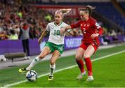29 November 2024; Denise O'Sullivan of Republic of Ireland in action against Lily Woodham of Wales during the UEFA Women's EURO 2025 Play-off Round Two first leg match between Wales and Republic of Ireland at Cardiff City Stadium in Wales. Photo by Harry Murphy/Sportsfile
