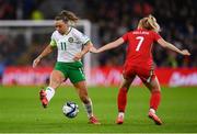 29 November 2024; Katie McCabe of Republic of Ireland in action against Ceri Holland of Wales during the UEFA Women's EURO 2025 Play-off Round Two first leg match between Wales and Republic of Ireland at Cardiff City Stadium in Wales. Photo by Stephen McCarthy/Sportsfile