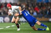 29 November 2024; Michael Lowry of Ulster in action against Jordan Larmour of Leinster during the United Rugby Championship match between Ulster and Leinster at Kingspan Stadium in Belfast. Photo by Ramsey Cardy/Sportsfile