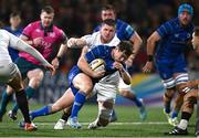 29 November 2024; Luke McGrath of Leinster evades the tackle of Ulster's Nick Timoney on his way to scoring his side's first try during the United Rugby Championship match between Ulster and Leinster at Kingspan Stadium in Belfast. Photo by Seb Daly/Sportsfile