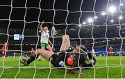 29 November 2024; Wales goalkeeper Olivia Clark fails reacts after failing to stop the shot of Ruesha Littlejohn of Republic of Ireland to concede her first goal, as Kyra Carusa of Republic of Ireland celebrates, during the UEFA Women's EURO 2025 Play-off Round Two first leg match between Wales and Republic of Ireland at Cardiff City Stadium in Wales. Photo by Stephen McCarthy/Sportsfile