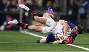 29 November 2024; Michael Lowry of Ulster is tackled by Charlie Tector of Leinster during the United Rugby Championship match between Ulster and Leinster at Kingspan Stadium in Belfast. Photo by Ramsey Cardy/Sportsfile