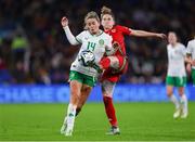 29 November 2024; Heather Payne of Republic of Ireland in action against Rachel Rowe of Wales during the UEFA Women's EURO 2025 Play-off Round Two first leg match between Wales and Republic of Ireland at Cardiff City Stadium in Wales. Photo by Harry Murphy/Sportsfile