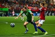 29 November 2024; Caroline Graham Hansen of Norway in action against Rebecca McKenna of Northern Ireland during the UEFA Women's EURO 2025 Play-off round two first leg match between Northern Ireland and Norway at Inver Park in Larne, Antrim. Photo by Shauna Clinton/Sportsfile