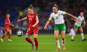 29 November 2024; Rachel Rowe of Wales and Katie McCabe of Republic of Ireland during the UEFA Women's EURO 2025 Play-off Round Two first leg match between Wales and Republic of Ireland at Cardiff City Stadium in Wales. Photo by Stephen McCarthy/Sportsfile