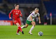 29 November 2024; Hayley Ladd of Wales in action against Julie-Ann Russell of Republic of Ireland during the UEFA Women's EURO 2025 Play-off Round Two first leg match between Wales and Republic of Ireland at Cardiff City Stadium in Wales. Photo by Stephen McCarthy/Sportsfile