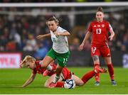29 November 2024; Katie McCabe of Republic of Ireland in action against Ceri Holland of Wales during the UEFA Women's EURO 2025 Play-off Round Two first leg match between Wales and Republic of Ireland at Cardiff City Stadium in Wales. Photo by Stephen McCarthy/Sportsfile