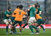 30 November 2024; Nick Frost of Australia is tackled by Joe McCarthy of Ireland during the Autumn Nations Series match between Ireland and Australia at the Aviva Stadium in Dublin. Photo by David Fitzgerald/Sportsfile