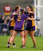 30 November 2024; Kilmacud Crokes' players, left to right, Kate Murray, Niamh Carr, and Sinéad O’Donoghue celebrate after the AIB LGFA All-Ireland Senior Club Championship semi-final match between Kilmacud Crokes of Dublin and Castleisland Desmonds of Kerry at Páirc de Burca in Stillorgan, Dublin. Photo by Daire Brennan/Sportsfile
