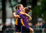 30 November 2024; Kilmacud Crokes' players Kate Murray, right, and Lauren Magee celebrate after the AIB LGFA All-Ireland Senior Club Championship semi-final match between Kilmacud Crokes of Dublin and Castleisland Desmonds of Kerry at Páirc de Burca in Stillorgan, Dublin. Photo by Daire Brennan/Sportsfile