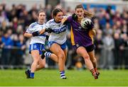 30 November 2024; Aoife Kane of Kilmacud Crokes in action against Hazel Bourke of Castleisland Desmonds during the AIB LGFA All-Ireland Senior Club Championship semi-final match between Kilmacud Crokes of Dublin and Castleisland Desmonds of Kerry at Páirc de Burca in Stillorgan, Dublin. Photo by Daire Brennan/Sportsfile
