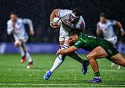 30 November 2024; Marcell Coetzee of Vodacom Bulls is tackled by Shayne Bolton of Connacht during the United Rugby Championship match between Connacht and Vodacom Bulls at Dexcom Stadium in Galway. Photo by Tyler Miller/Sportsfile