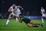 30 November 2024; Marcell Coetzee of Vodacom Bulls is tackled by Shayne Bolton of Connacht during the United Rugby Championship match between Connacht and Vodacom Bulls at Dexcom Stadium in Galway. Photo by Tyler Miller/Sportsfile