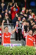 30 November 2024; Cuala captain James Power, left, and teammate Luke Keating lift the Seán McCabe Cup after the AIB Leinster GAA Senior Club Football Championship final match between Cuala of Dublin and Ardee St Mary's of Louth at Croke Park in Dublin. Photo by Piaras Ó Mídheach/Sportsfile