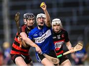 1 December 2024; Colm McCarthy of Sarsfields is fouled by Pauric Mahony of Ballygunner, left, during the AIB Munster GAA Senior Club Hurling Championship final match between Ballygunner and Sarsfields at FBD Semple Stadium in Thurles, Tipperary. Photo by Piaras Ó Mídheach/Sportsfile