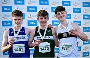 1 December 2024; Under 17 boys 4500m medallists, Harry Mckenzie of Enniskillen RC, Fermanagh, centre, gold, Odhran McBrearty of Finn Valley AC, Donegal, left, silver, and Harry Cahill of Donore Harriers AC, Dublin, right, bronze, during the 123.ie National Novice and Juvenile Uneven Age Cross Country Championships at Tramore Racecourse in Tramore, Waterford. Photo by Sam Barnes/Sportsfile