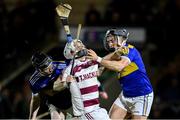 1 December 2024; Cormac O'Doherty of Slaughtneil in action against Caolan Taggart, left, and Caolan Taggart of Portaferry during the AIB Ulster GAA Senior Club Hurling Championship final match between Portaferry of Down and Slaughtneil of Derry at BOX-IT Athletic Grounds in Armagh. Photo by Ramsey Cardy/Sportsfile