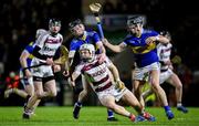 1 December 2024; Cormac O'Doherty of Slaughtneil in action against Caolan Taggart, left, and Caolan Taggart of Portaferry during the AIB Ulster GAA Senior Club Hurling Championship final match between Portaferry of Down and Slaughtneil of Derry at BOX-IT Athletic Grounds in Armagh. Photo by Ramsey Cardy/Sportsfile