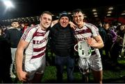 1 December 2024; Mark McGuigan, left, and Shane McGuigan of Slaughtneil, with their dad Christopher after the AIB Ulster GAA Senior Club Hurling Championship final match between Portaferry of Down and Slaughtneil of Derry at BOX-IT Athletic Grounds in Armagh. Photo by Ramsey Cardy/Sportsfile
