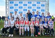 1 December 2024; Under 15 girls 3500m team medallists, Westport AC, Mayo, gold, centre, Mid Sutton AC, Dublin, silver, left, and Finn Valley AC, Donegal, bronze, right, during the 123.ie National Novice and Juvenile Uneven Age Cross Country Championships at Tramore Racecourse in Tramore, Waterford. Photo by Sam Barnes/Sportsfile