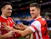 30 November 2024; Cuala players Jamie Keenan, right, and James Power celebrate after their side's victory in the AIB Leinster GAA Senior Club Football Championship final match between Cuala of Dublin and Ardee St Mary's of Louth at Croke Park in Dublin. Photo by Piaras Ó Mídheach/Sportsfile