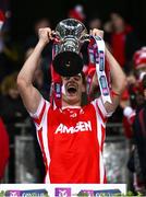 30 November 2024; Aodhan English of Cuala lifts the cup after the AIB Leinster GAA Senior Club Football Championship final match between Cuala of Dublin and Ardee St Mary's of Louth at Croke Park in Dublin. Photo by Ben McShane/Sportsfile