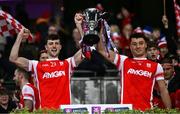 30 November 2024; Cillian Dunne, left, and Peter Duffy of Cuala lift the cup after the AIB Leinster GAA Senior Club Football Championship final match between Cuala of Dublin and Ardee St Mary's of Louth at Croke Park in Dublin. Photo by Ben McShane/Sportsfile