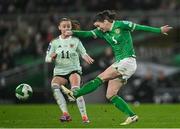 3 December 2024; Niamh Fahey of Republic of Ireland in action against Hannah Cain of Wales during the UEFA Women's EURO 2025 Play-off Round Two second leg match between Republic of Ireland and Wales at the Aviva Stadium in Dublin. Photo by Shauna Clinton/Sportsfile