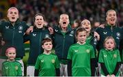 3 December 2024; Republic of Ireland players, from left, Caitlin Hayes, Niamh Fahey, Ruesha Littlejohn, Denise O'Sullivan and Anna Patten stand for the playing of the National Anthem before the UEFA Women's EURO 2025 Play-off Round Two second leg match between Republic of Ireland and Wales at the Aviva Stadium in Dublin. Photo by Stephen McCarthy/Sportsfile
