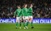 3 December 2024; Republic of Ireland players, from left, Niamh Fahey, Anna Patten and Caitlin Hayes during the UEFA Women's EURO 2025 Play-off Round Two second leg match between Republic of Ireland and Wales at the Aviva Stadium in Dublin. Photo by Stephen McCarthy/Sportsfile